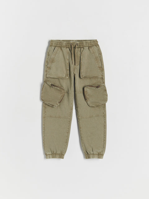 Khaki cargo pants on a white background