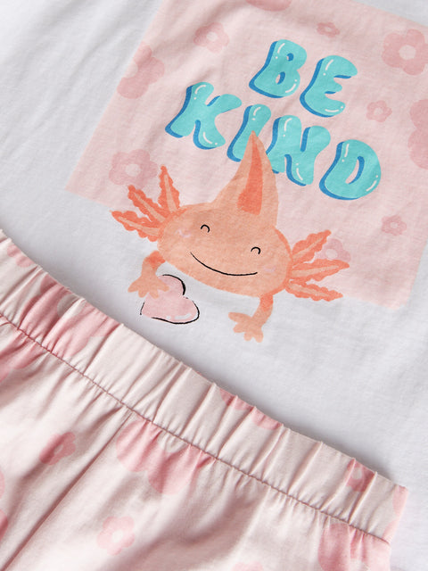 Children's outfit with axolotl and 'Be Kind' text on a pink and white background