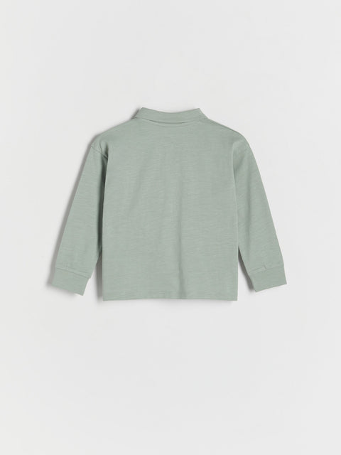 Light green long-sleeve shirt on a white background