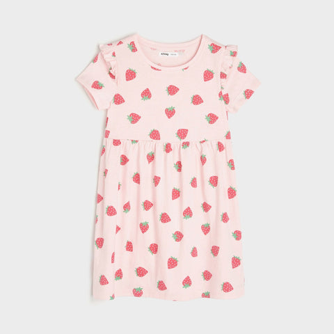 Pink dress with strawberry pattern on a white background