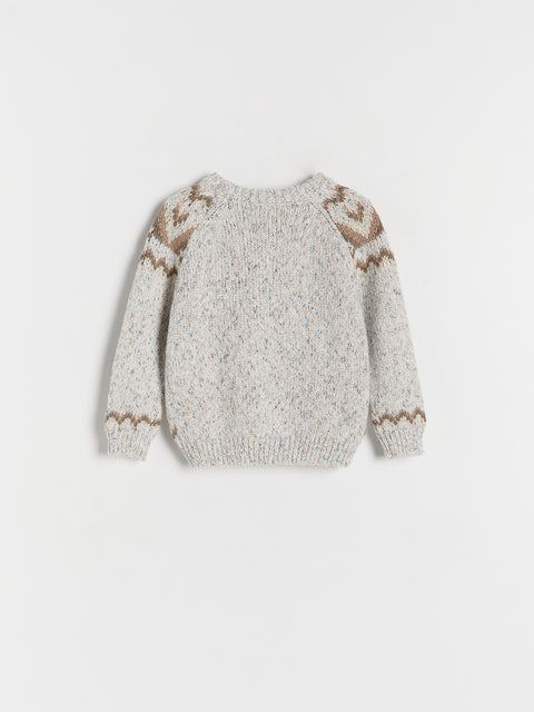 Knitted sweater with patterned sleeves on a white background
