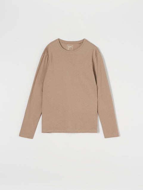 Beige long-sleeve shirt on a light gray background