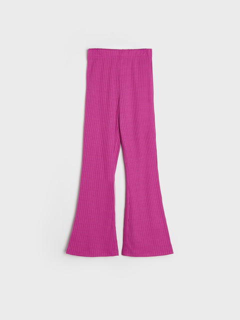 Pink ribbed pants on a white background