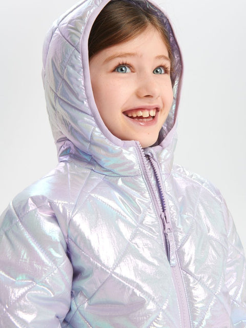 Child wearing a iridescent puffer jacket on a white background