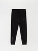 Black jogger pants with a logo on a white background