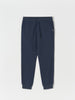 Navy blue jogger pants on a light gray background