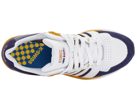White sneaker with blue and yellow accents on a white background