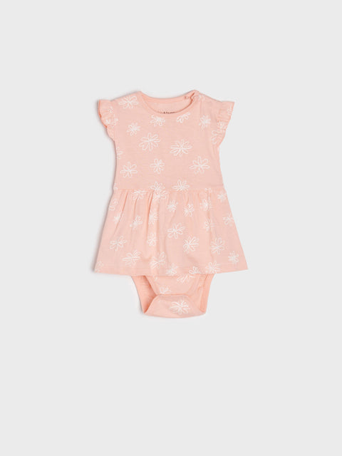 Pink baby romper with floral pattern on a light gray background