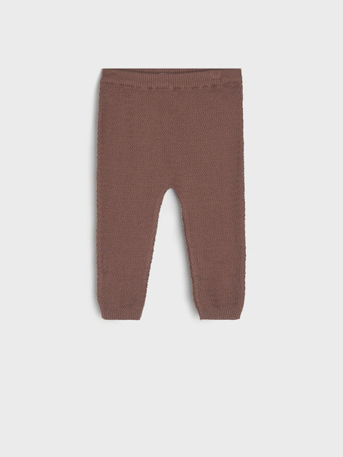 Brown baby leggings on a light gray background