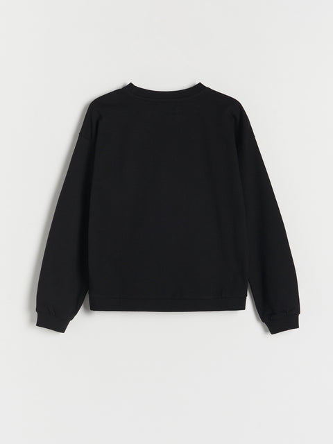 Black sweatshirt on a light gray background