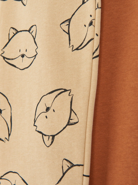 Fabric with fox pattern on beige and plain brown fabric