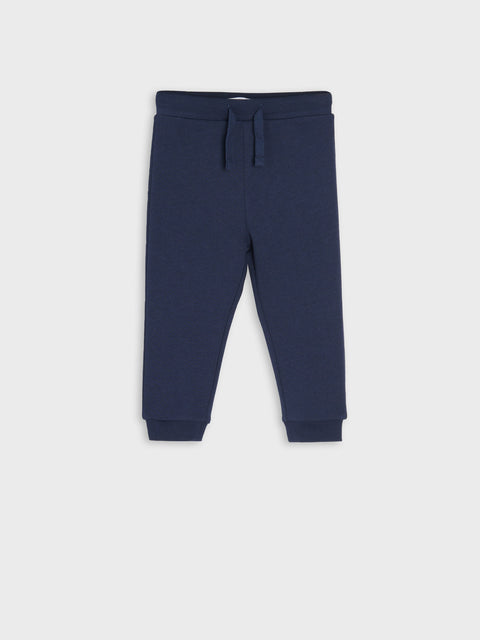 Navy blue sweatpants on a white background