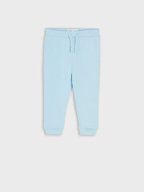 Light blue pants on a white background