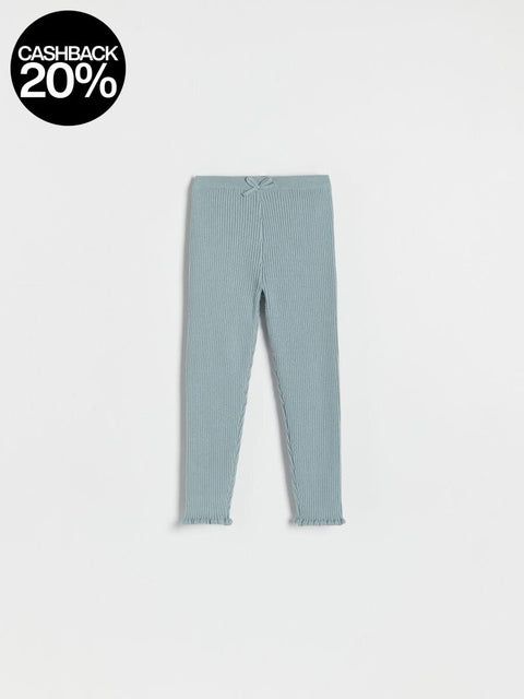 Light blue ribbed leggings on a white background