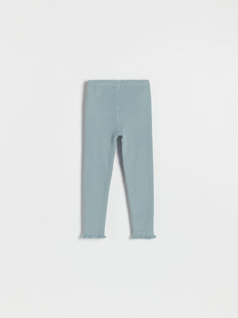 Light blue ribbed leggings on a white background