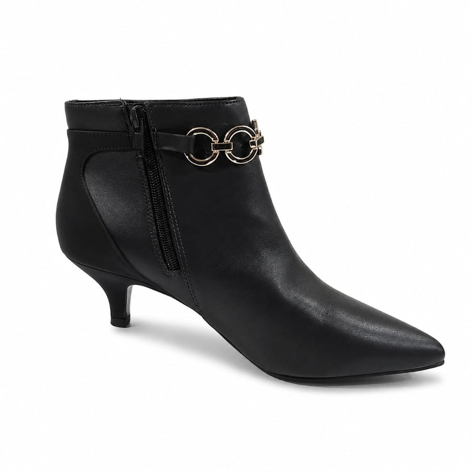 A black pointed-toe ankle boot with a kitten heel, side zipper, and a decorative gold-tone double-ring buckle detail on the front strap, shown against a plain white background.