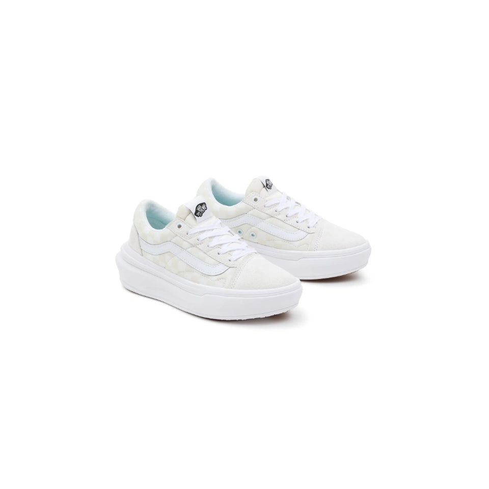 A pair of white low-top platform sneakers with a subtle tonal pattern on the uppers, white laces, and thick white platform soles, shown against a plain white background.