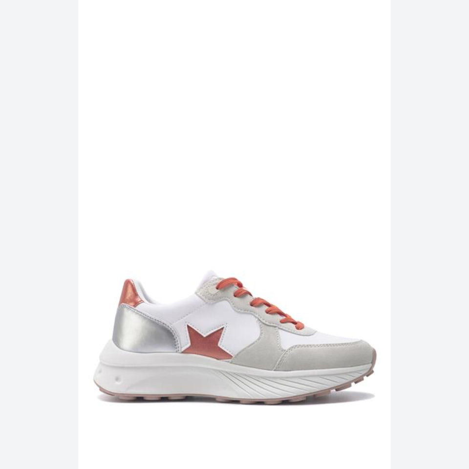 A white and silver sneaker with coral pink accents, including the laces, heel tab, and star-shaped side detail, shown in a side profile on a white background.