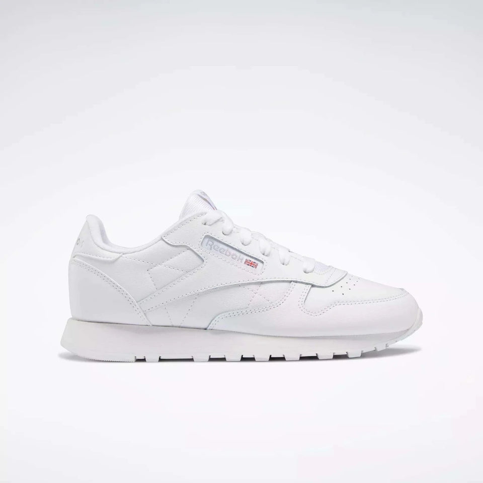 A classic Reebok sneaker in white leather, shown from the side against a clean white background.