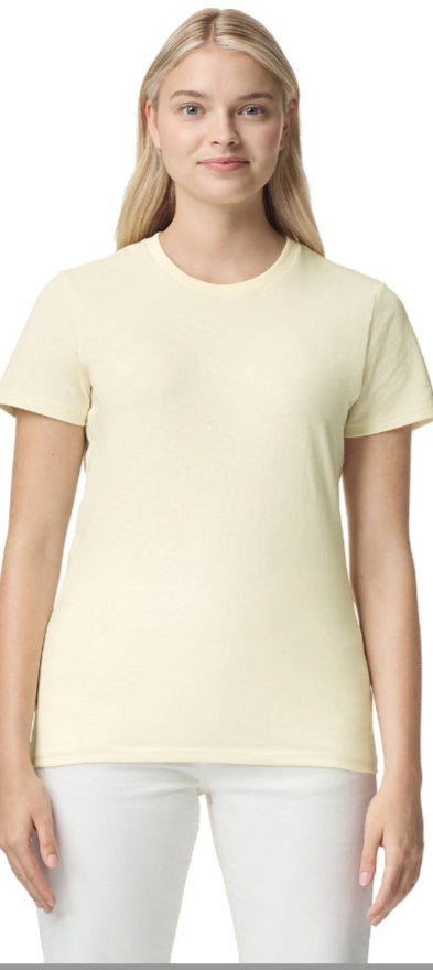 Woman wearing a light yellow t-shirt and white pants on a website homepage.