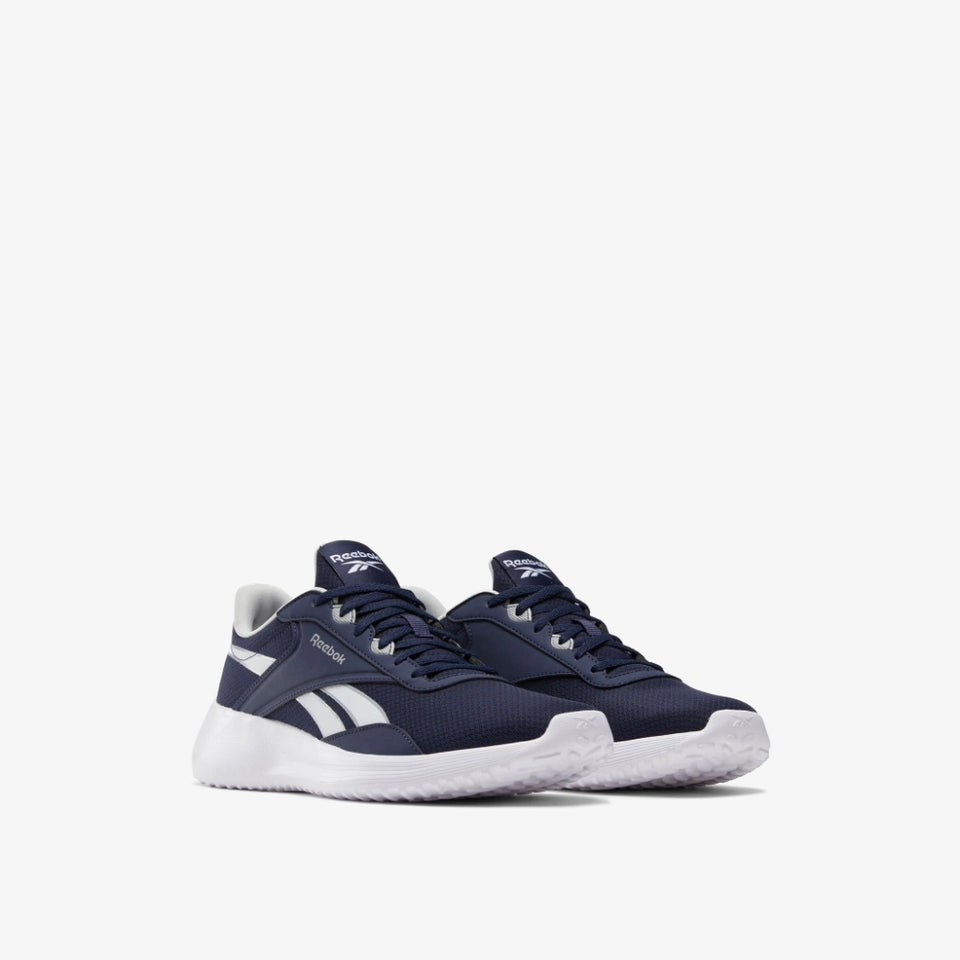 A pair of Reebok sneakers in navy blue and white, shown from a three-quarters angle against a clean white background.