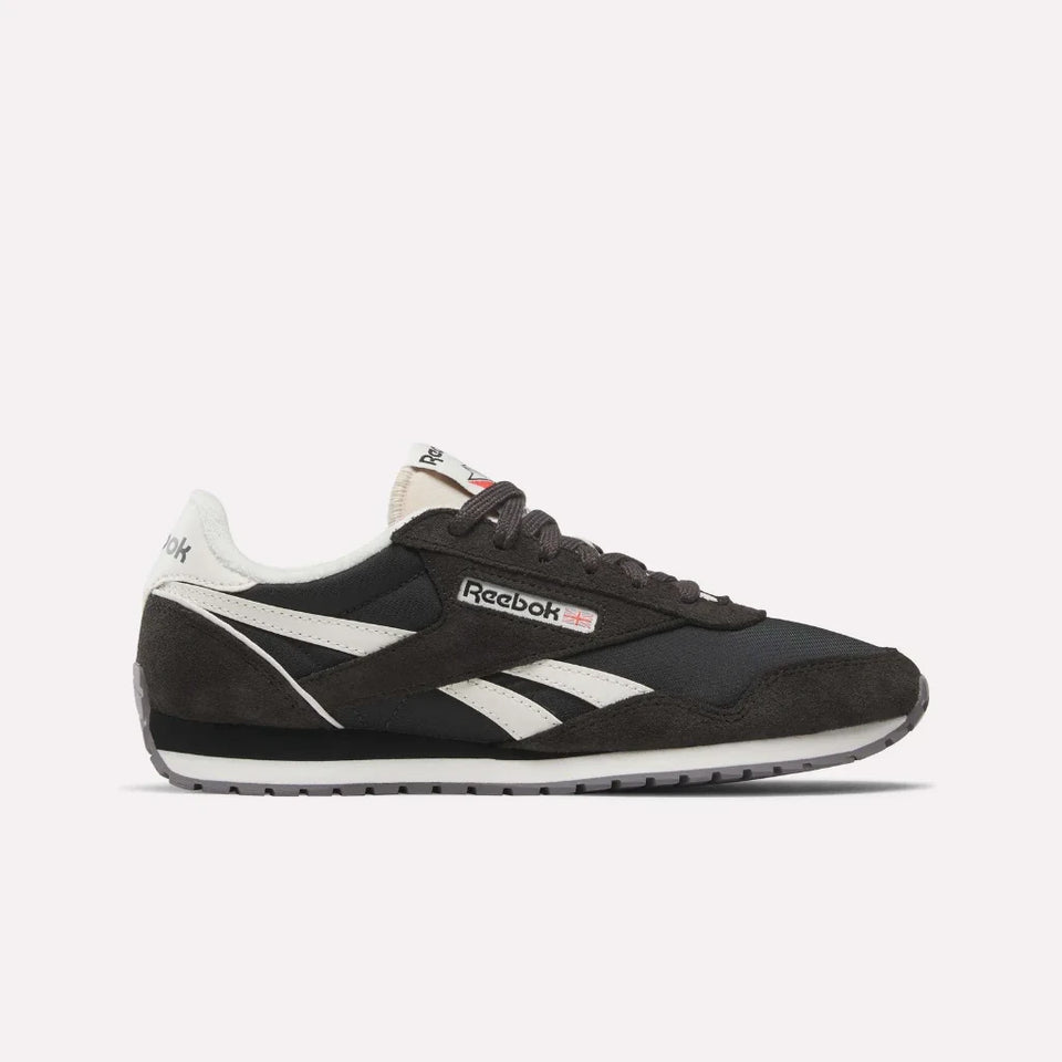 Black Reebok sneaker on a white background