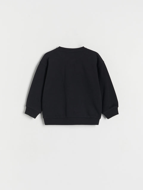 Black sweatshirt on a light gray background
