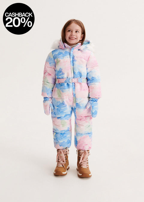 Child wearing a colorful snowsuit on a white background