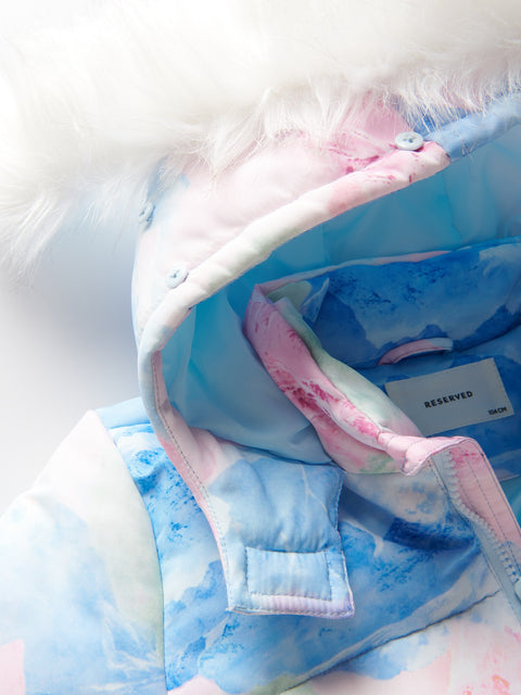 Children's jacket with pink and blue design on a white background