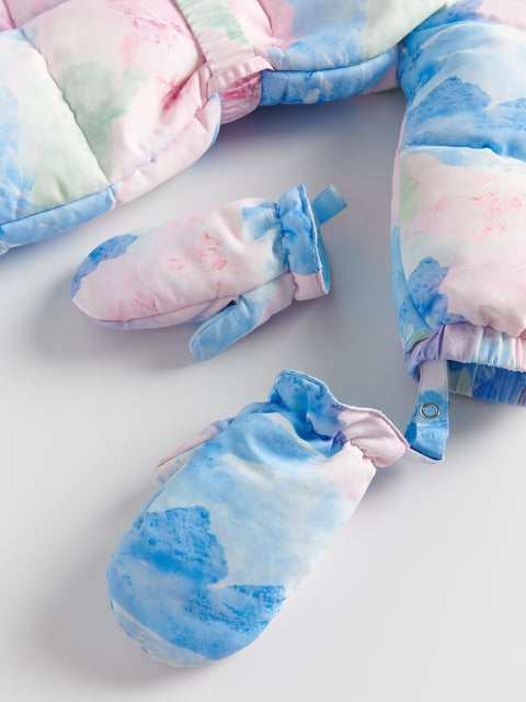 Pastel-colored baby outfit with matching hat and mittens on a light background