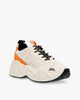 White sneaker with orange accents on a white background