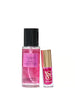 Victoria's Secret Pure Seduction fragrance mist and lip gloss on a white background