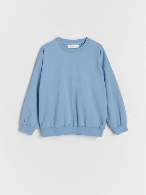 Light blue sweatshirt on a light gray background