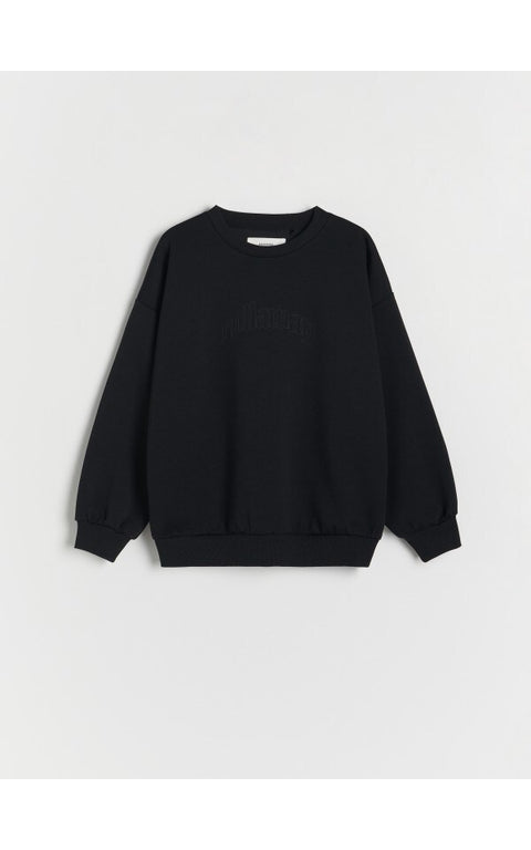Black sweatshirt on a light gray background