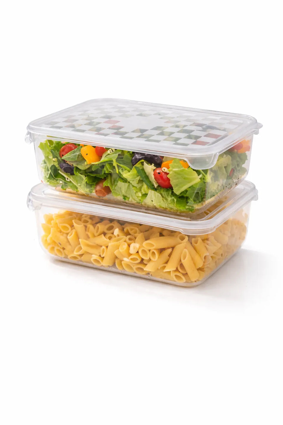 Two stacked food containers with salad and pasta on a white background