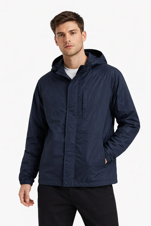 Man wearing a navy blue jacket on a white background