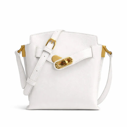 White handbag with gold accents on a white background