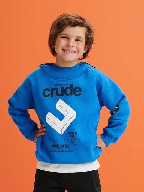 Child wearing a blue hoodie with a logo and text on an orange background