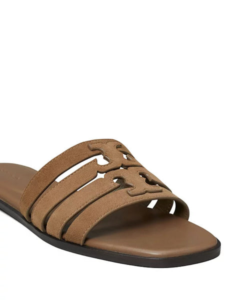 Brown sandal with decorative straps on a white background