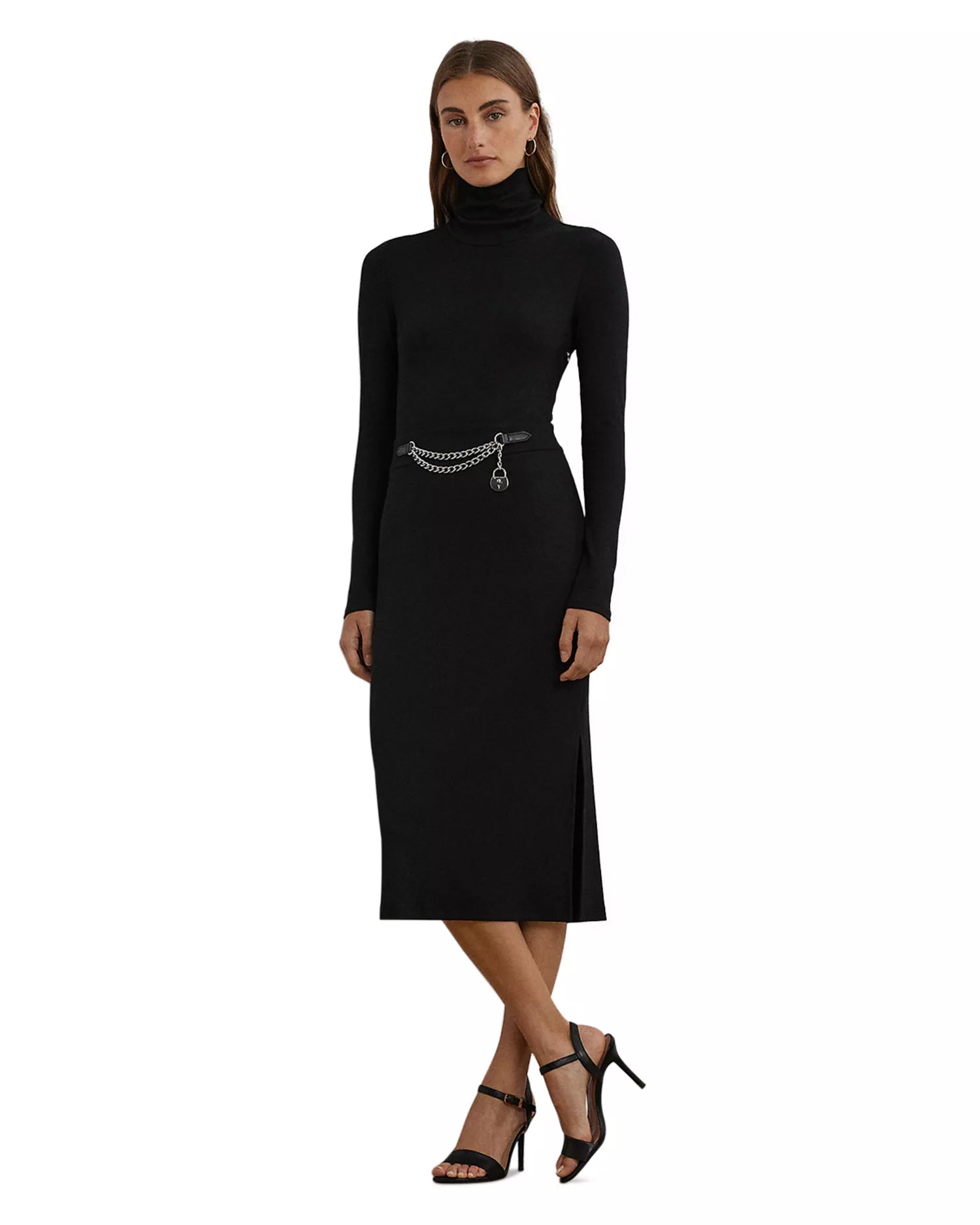 Black dress with a chain detail on a white background