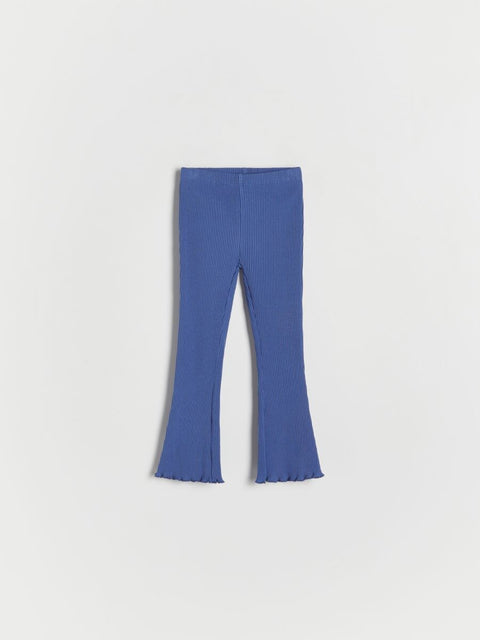 Blue flared pants on a white background
