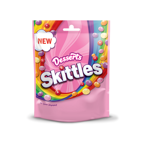 Skittles dessert packaging with colorful design and pink background