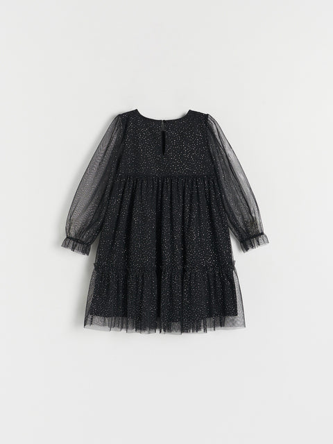 Black tulle dress with sheer sleeves on a white background