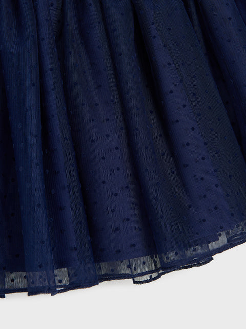 Navy blue fabric with a subtle pattern on a white background