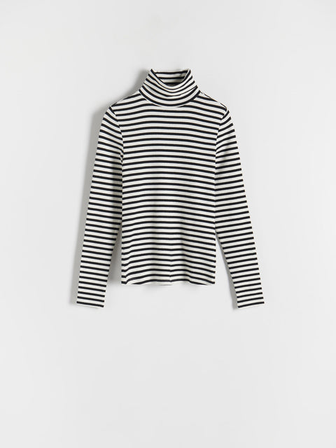 Black and white striped turtleneck sweater on a light gray background