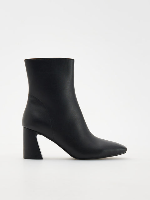 Reserved Women's Black Leather Asymmetrical Heel Ankle Boots | Reserved In Lebanon
