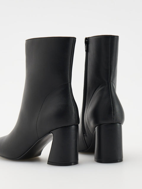 Reserved Women's Black Leather Asymmetrical Heel Ankle Boots | Reserved In Lebanon