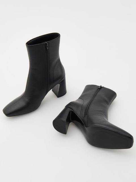 Reserved Women's Black Leather Asymmetrical Heel Ankle Boots | Reserved In Lebanon