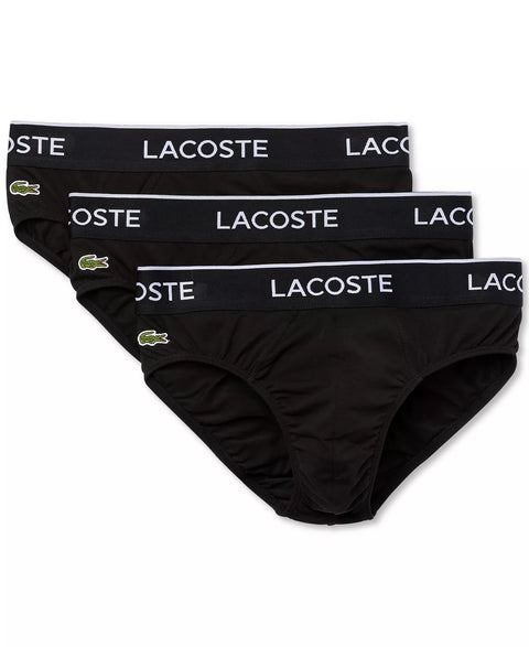 Three pairs of Lacoste black men's underwear on a white background