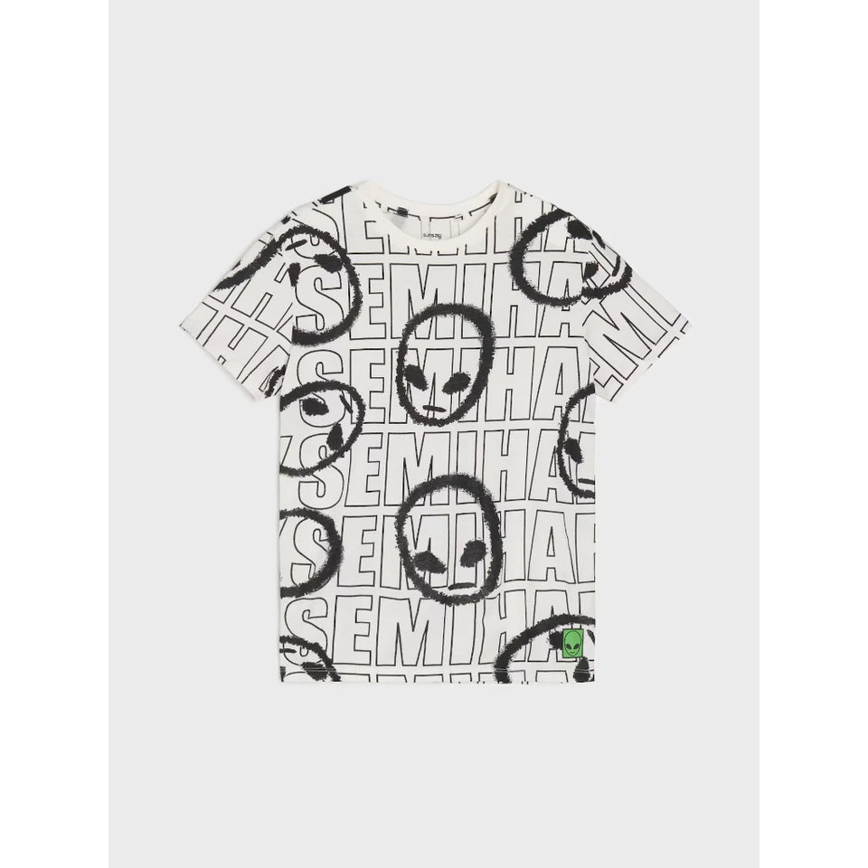 A short-sleeve crewneck t-shirt featuring an all-over black graphic print of semi-colon smiley faces and the word 'SEMI' in a typographic pattern on a white background.